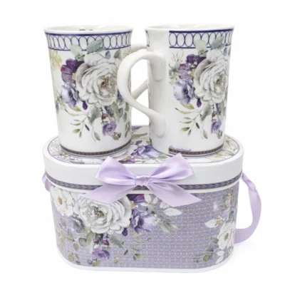 Two tall teacups in a floral gift box